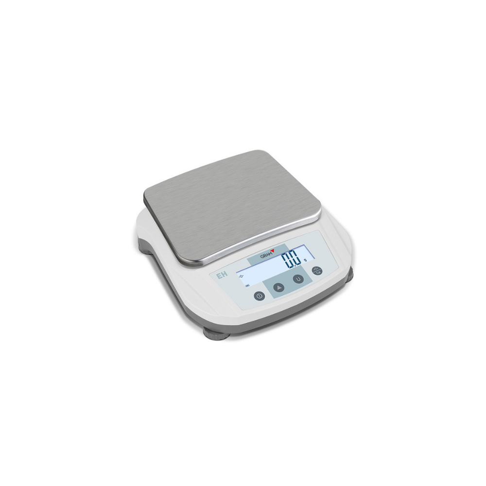 Balança de precisão GRAM Fábrica das etiquetas, com visor digital e corpo compacto para pesagem exata de pequenas quantidades.