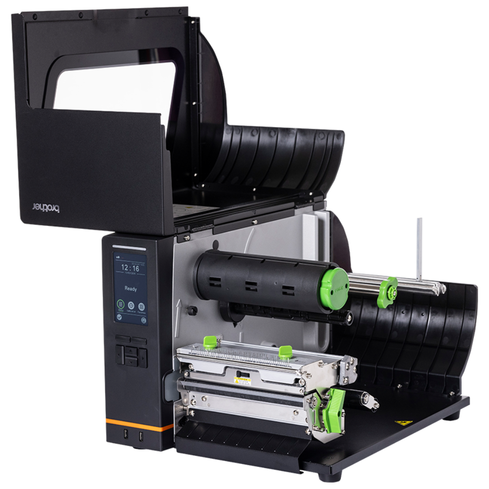 Impressora Brother TJ-6421TN da Fábrica das etiquetas, vista frontal com tela de controlo e rolo de etiquetas.